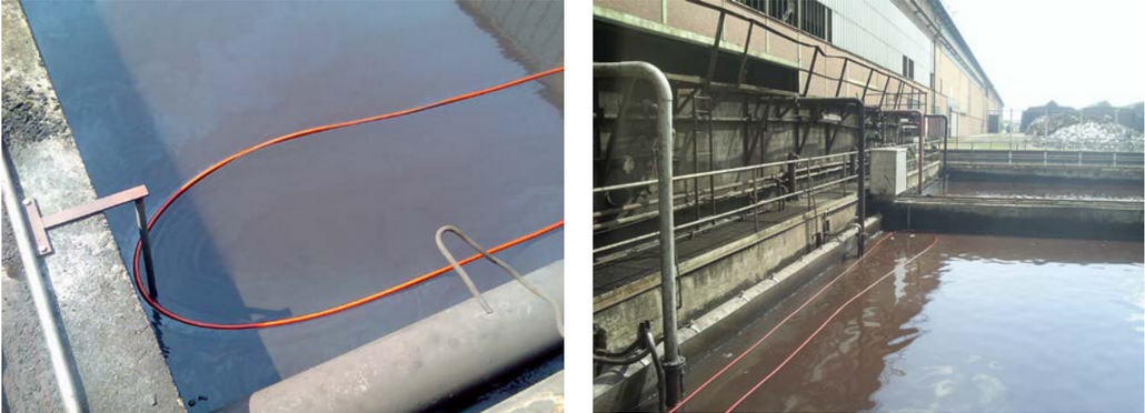 Oil collection hose with guide for oil skimmer.